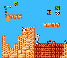 The player shatters rocks with a hammer while clocks and frogs run amok around him.